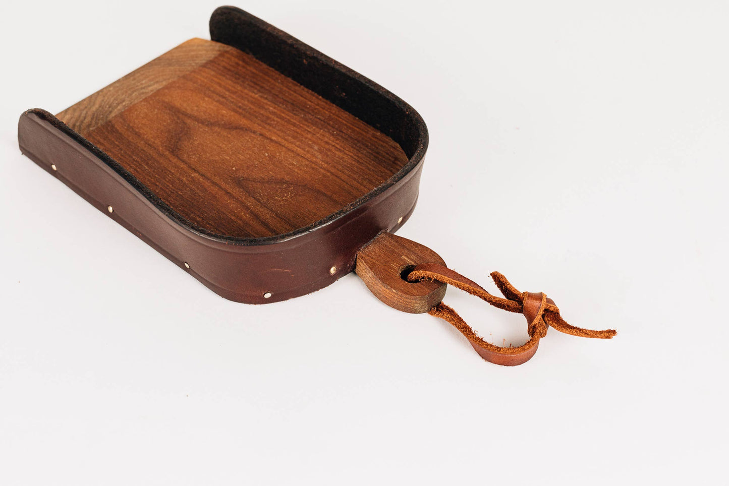 The Child's Leather and Wood Dustpan