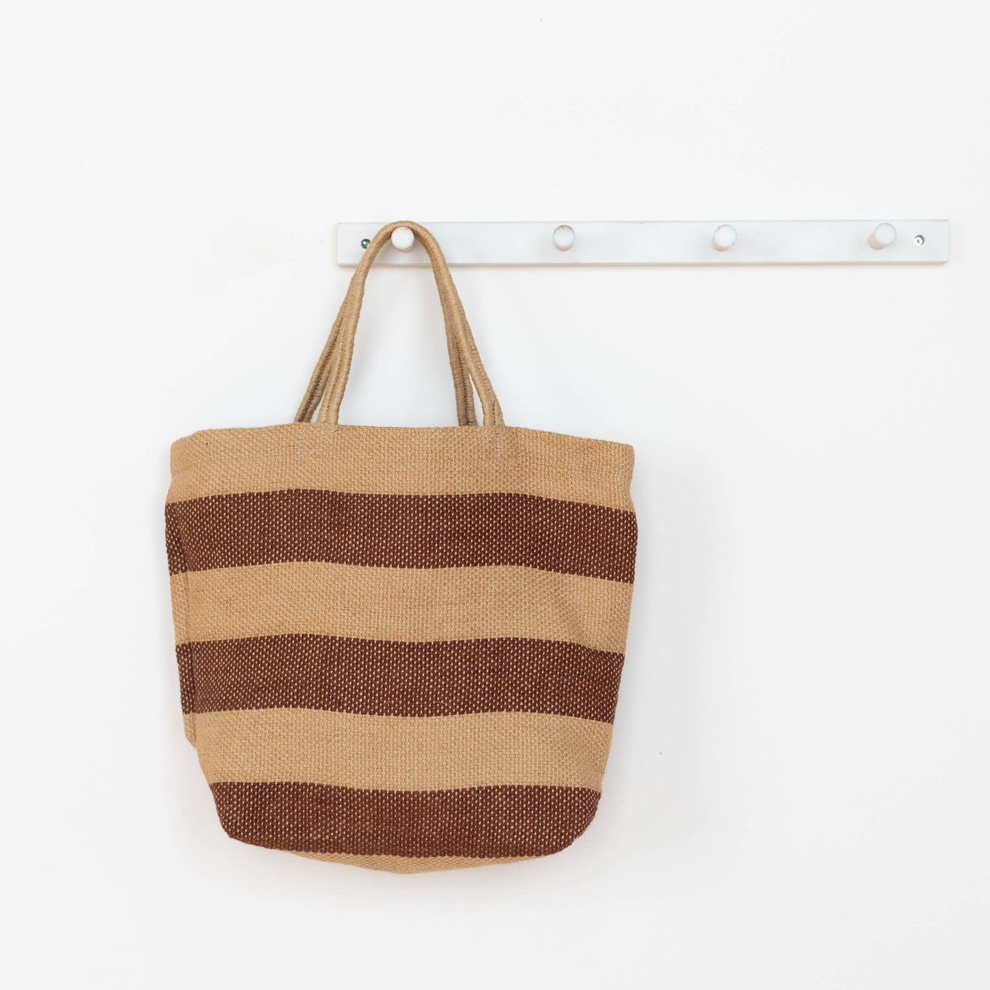 Tote bag with brown and beige stripes on a white background