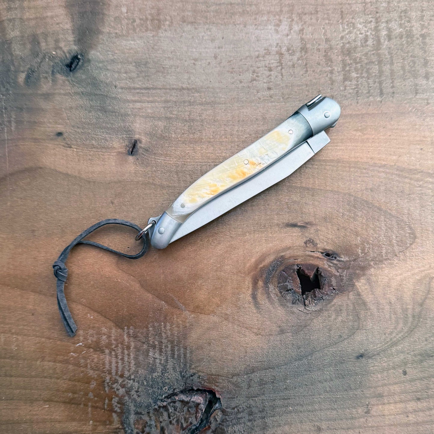 Forge de Laguiole Tradition 11 cm Pocket Knife with Cattle Horn Handle and Satin Finish