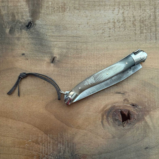 Forge de Laguiole Tradition 11 cm Pocket Knife with Cattle Horn Handle and Brut De Forge Blade